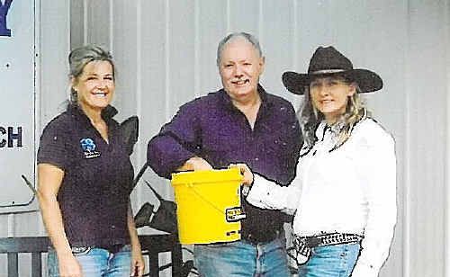 Margo Keeley of Tin Can Bay Houseboats (left) and Kathy J Kunst watch on as Graham Neilson draws the winner of the houseboat holiday. Margo Keeley of Tin Can Bay Houseboats (left) and Kathy J Kunst watch on as Graham Neilson draws the winner of the houseboat holiday.